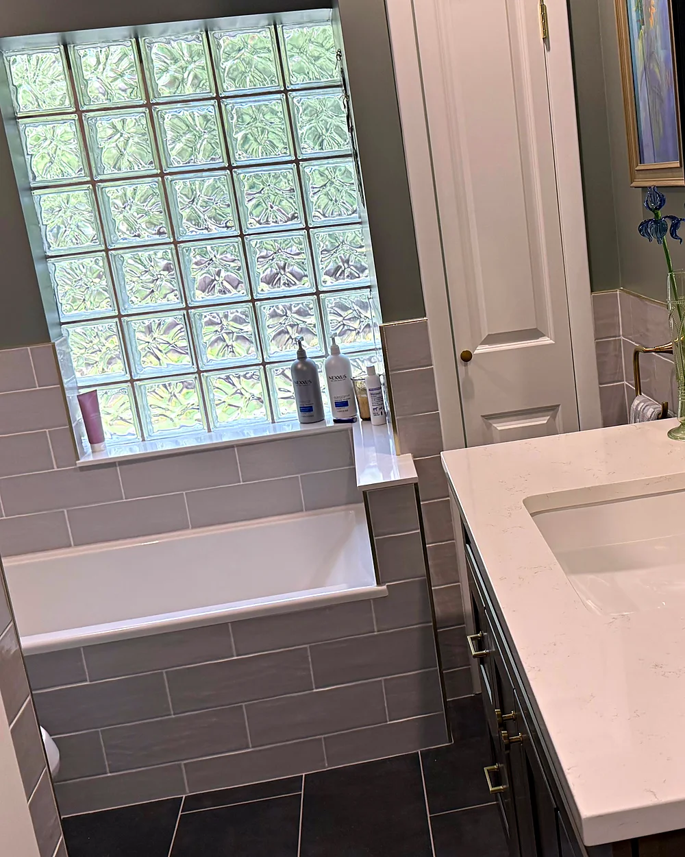 Clean bathroom with glass-block window in Dover, NJ