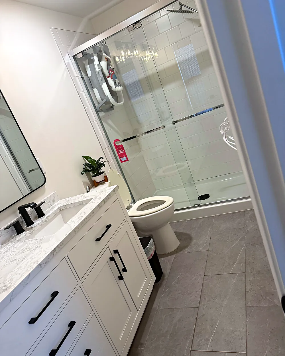 White bathroom with glass shower, house cleaning in Mount Arlington, NJ