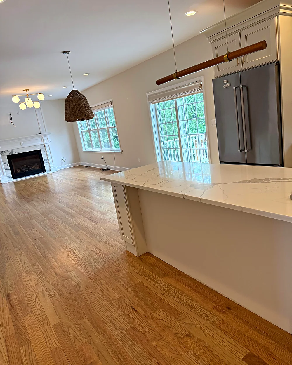 Open kitchen and living area after a house cleaning in Peapack, NJ
