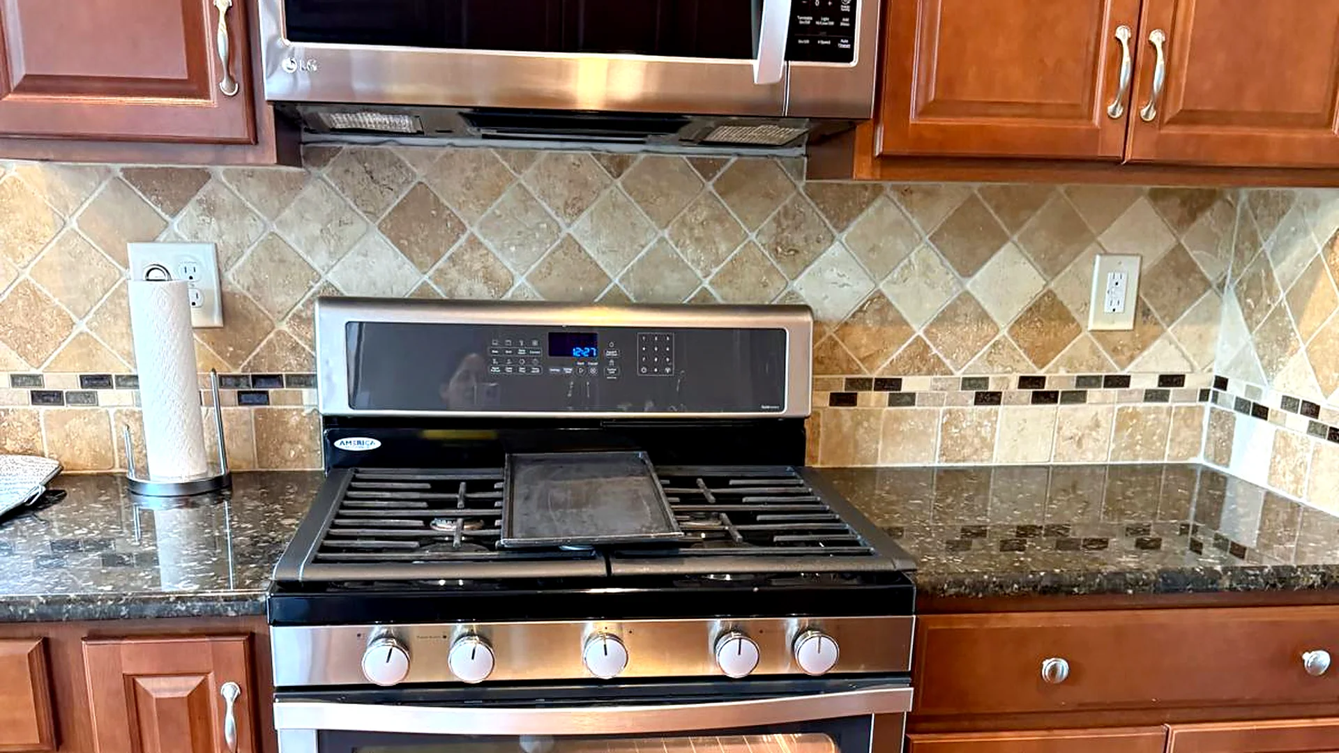 Clean stove, granite counters and backsplash after a house cleaning in Chester, NJ