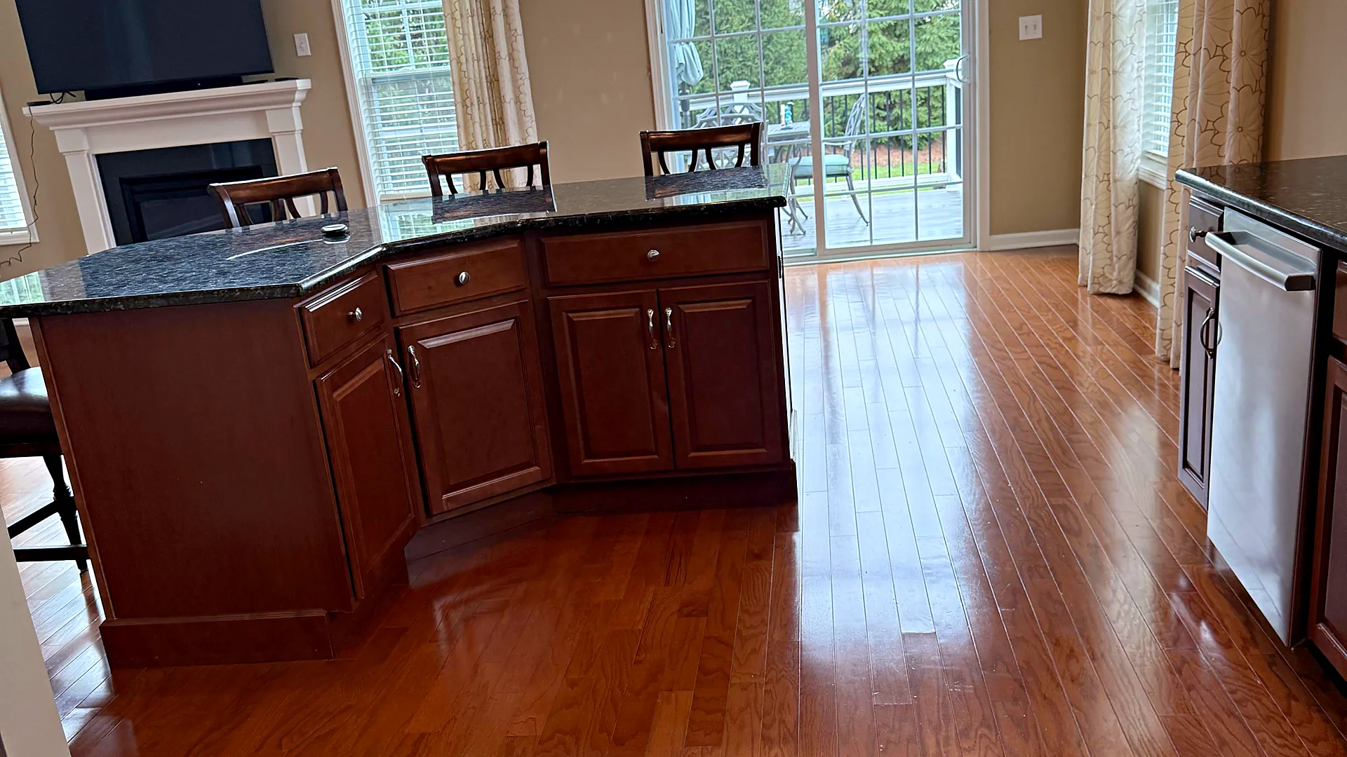 Open kitchen and family room with hardwood floors, house cleaning in Morristown, NJ