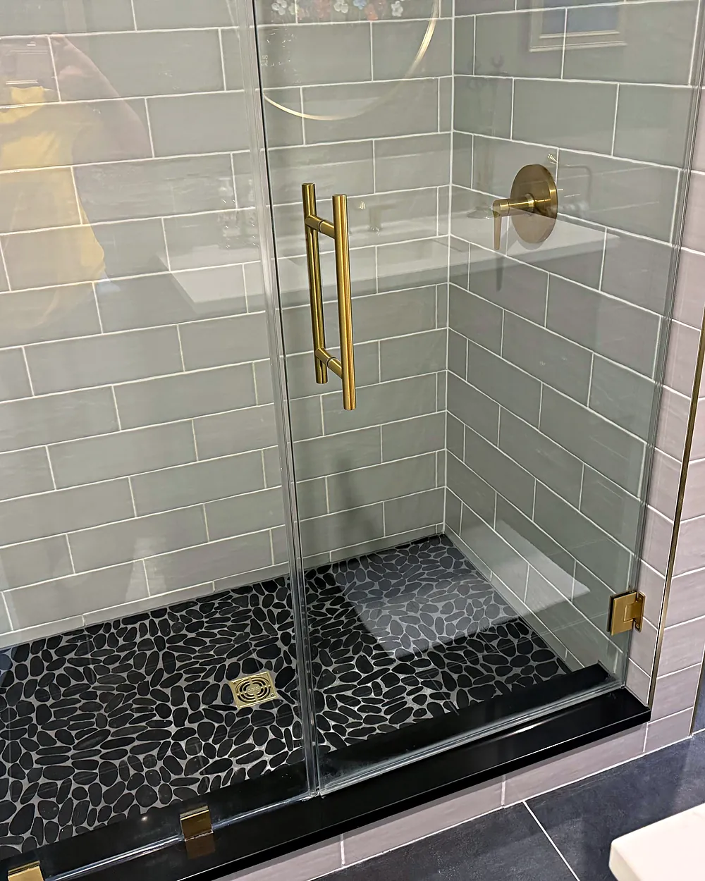 Glass shower with pebble floor, house cleaning in Sparta, NJ