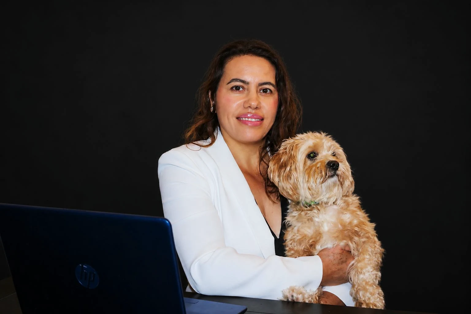 Patricia Garcia with her dog - pet-friendly house cleaning in Dover, NJ